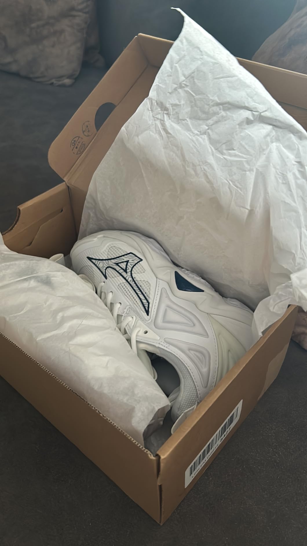 Close up detail of Mizuno Wave Momentum 3 showing Dura Shield toe protection and sole pattern