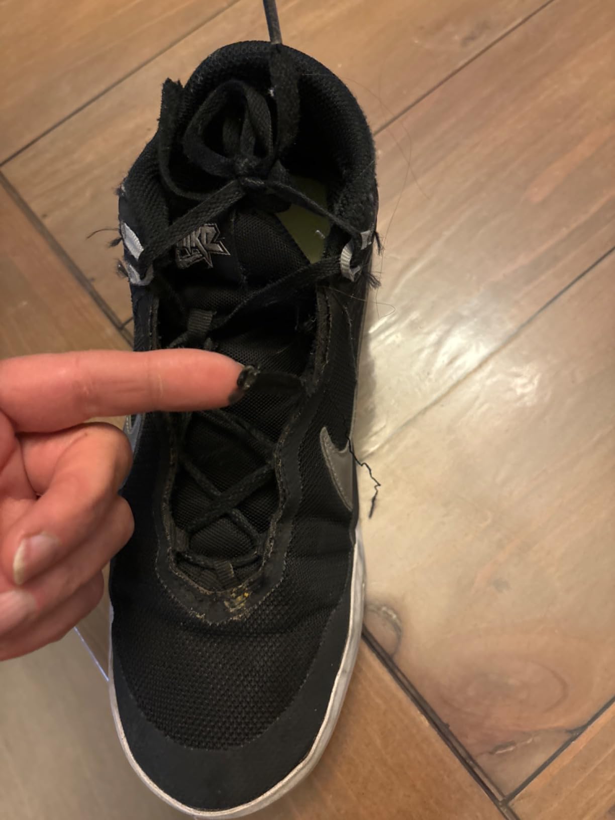 Worn Nike Team Hustle D 10 showing wear patterns after extended basketball use