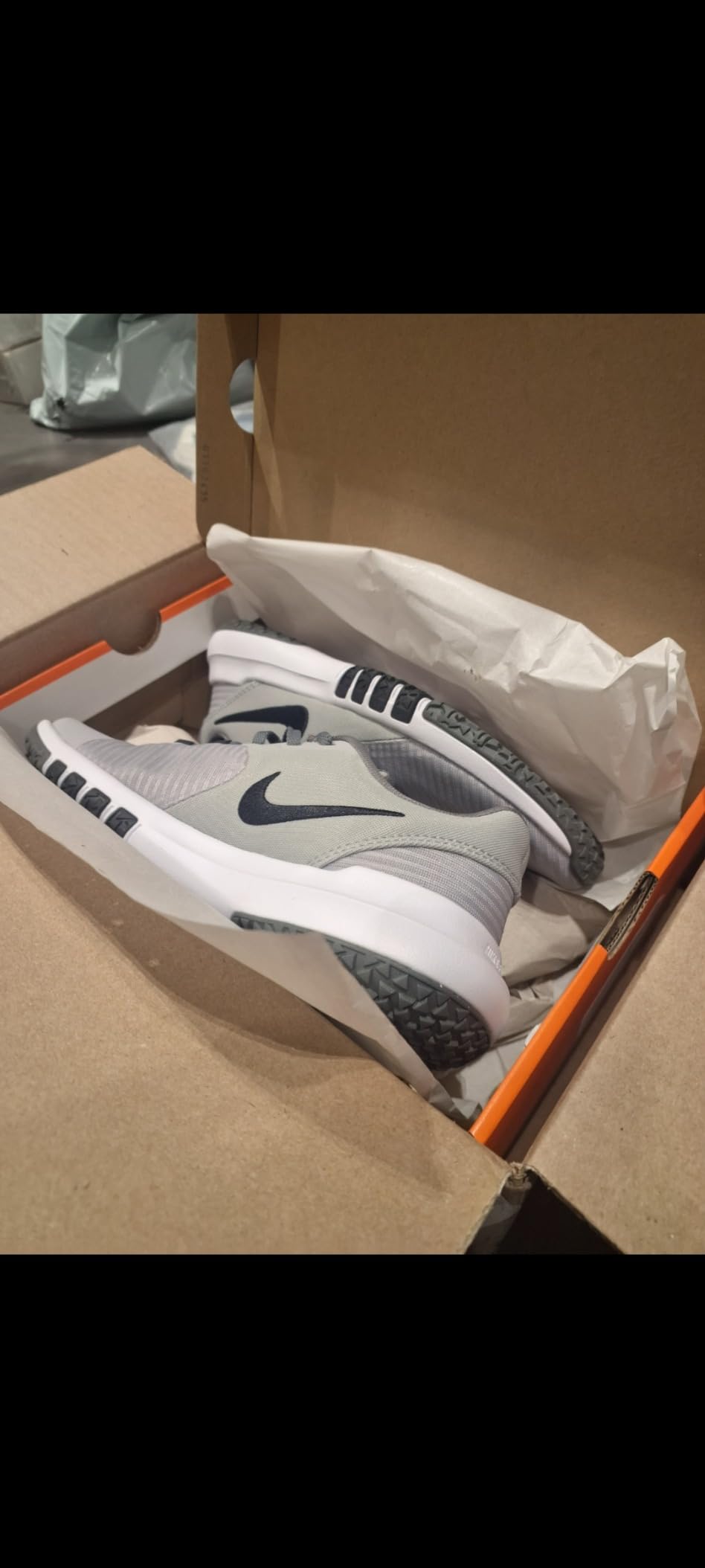 Nike Flex Control TR3 outsole showing deep flex grooves and rubber tread pattern for gym traction