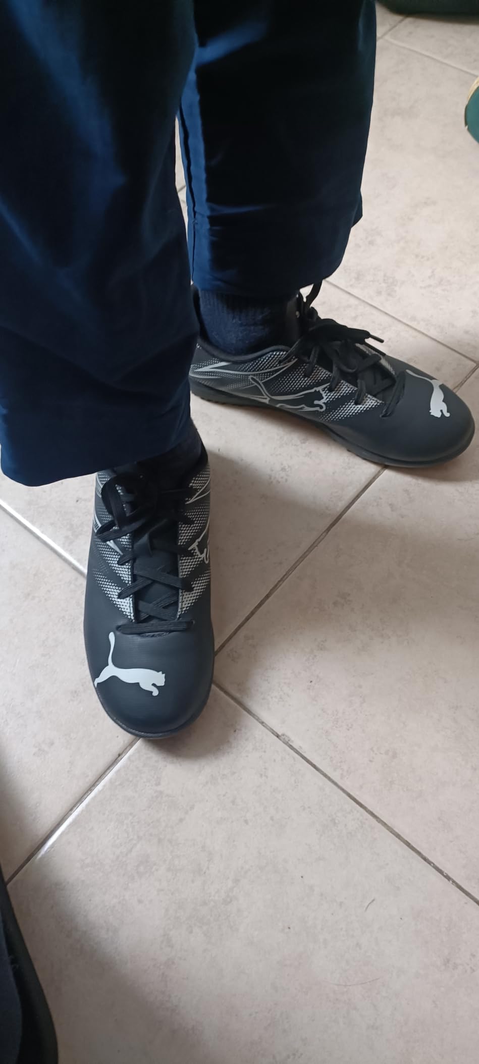PUMA Attacanto soccer cleats in action showing wear patterns after months of use