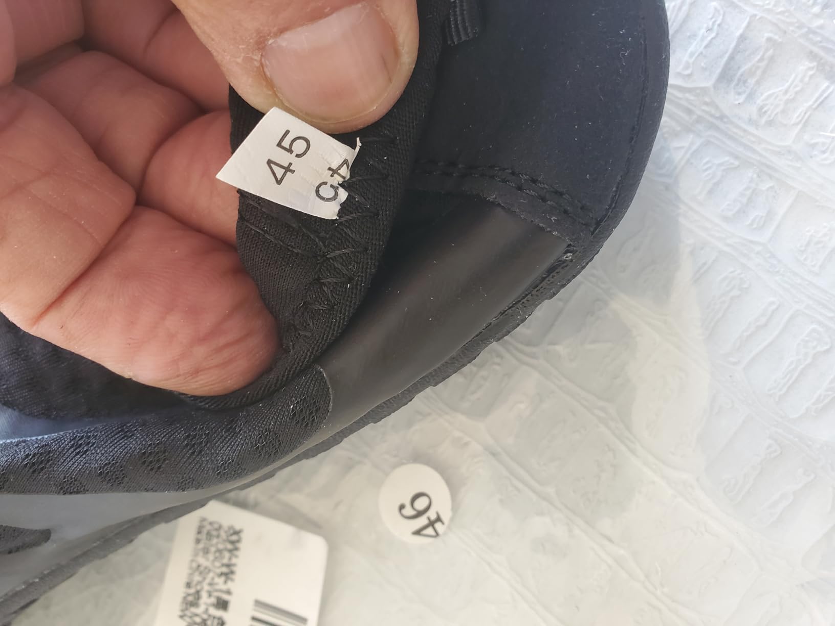 Product packaging and sizing information showing unisex design