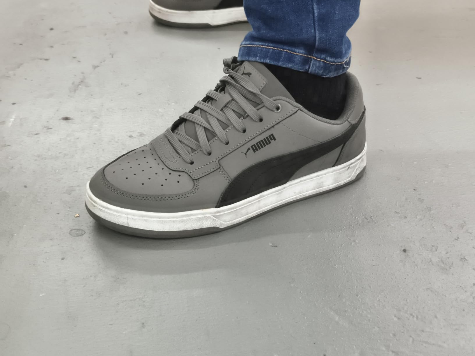 PUMA Caven 2.0 side profile showing stacked midsole design and overall silhouette