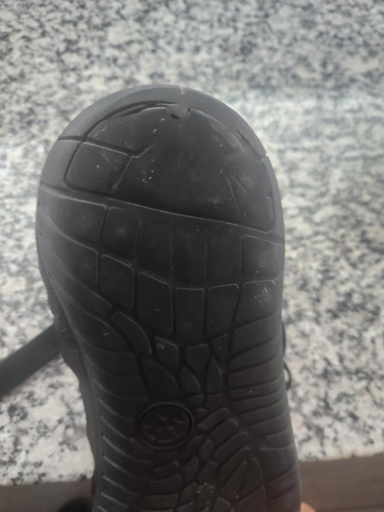 Wrestling shoe sole showing rubber tread pattern and zero drop construction detail