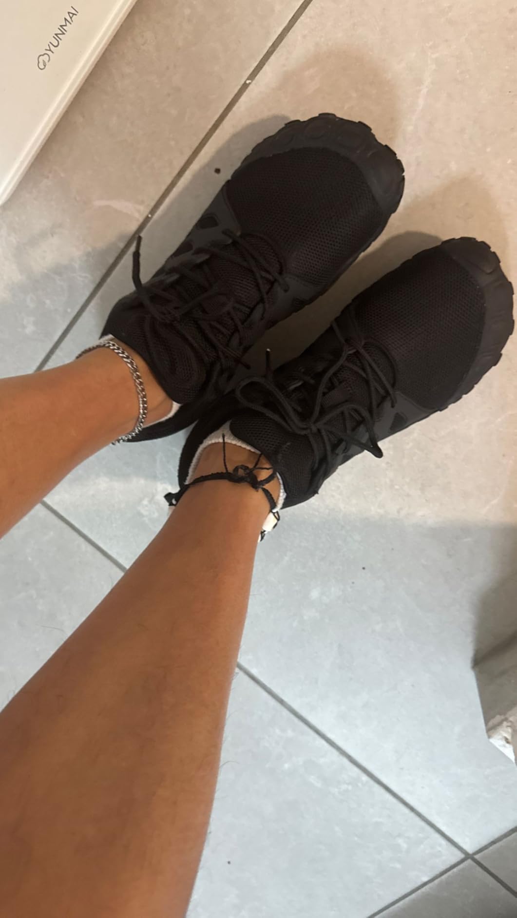 Oranginer shoes being worn during workout showing flexibility and ground contact during exercise