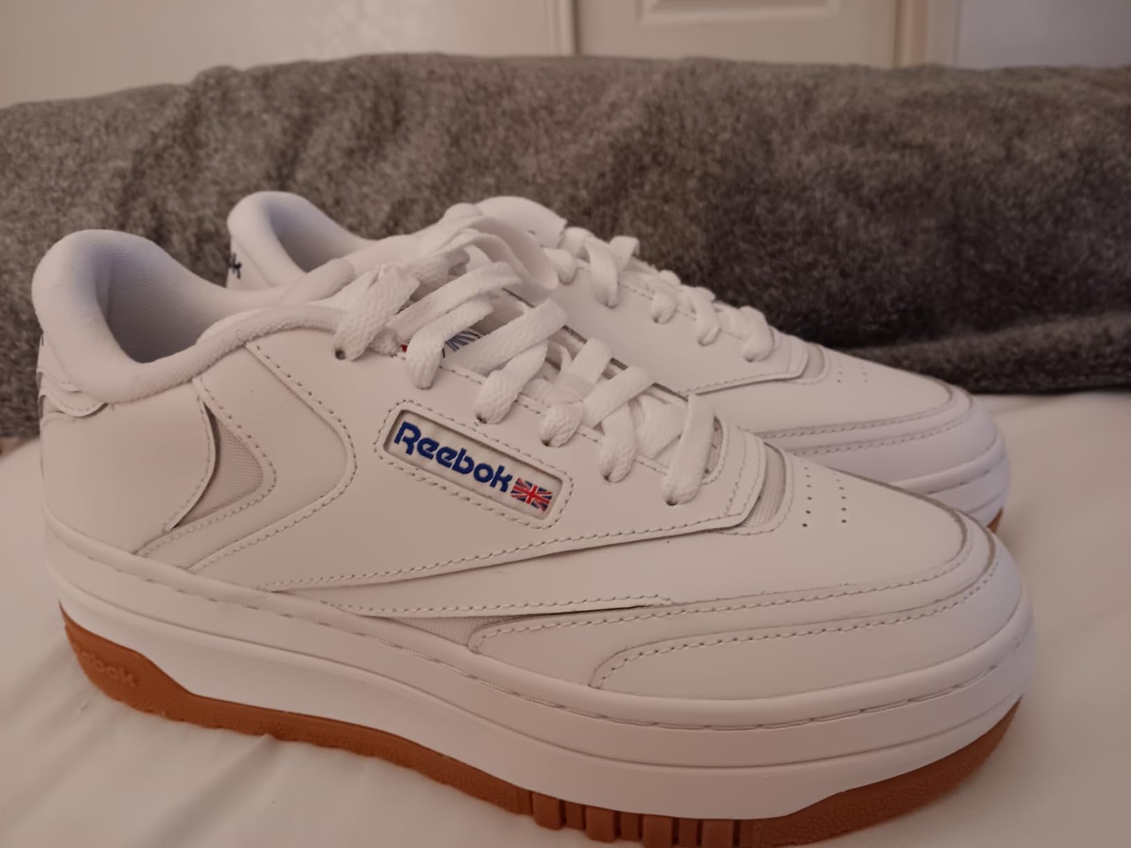 Close-up of Reebok Club C Extra after 6 weeks of wear showing leather condition and sole wear