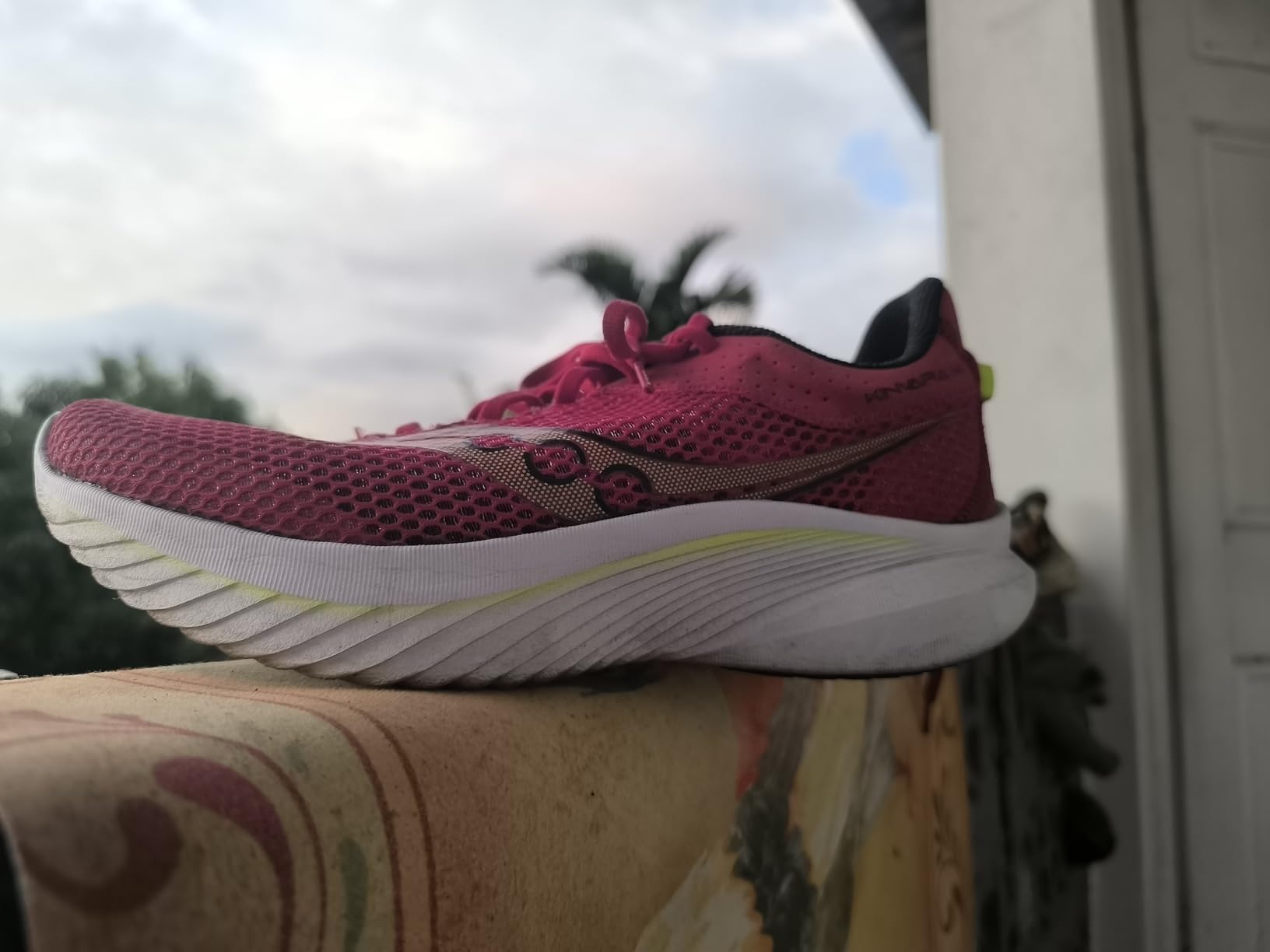 Saucony Kinvara 14 lacing system and tongue design showing engineered mesh breathability