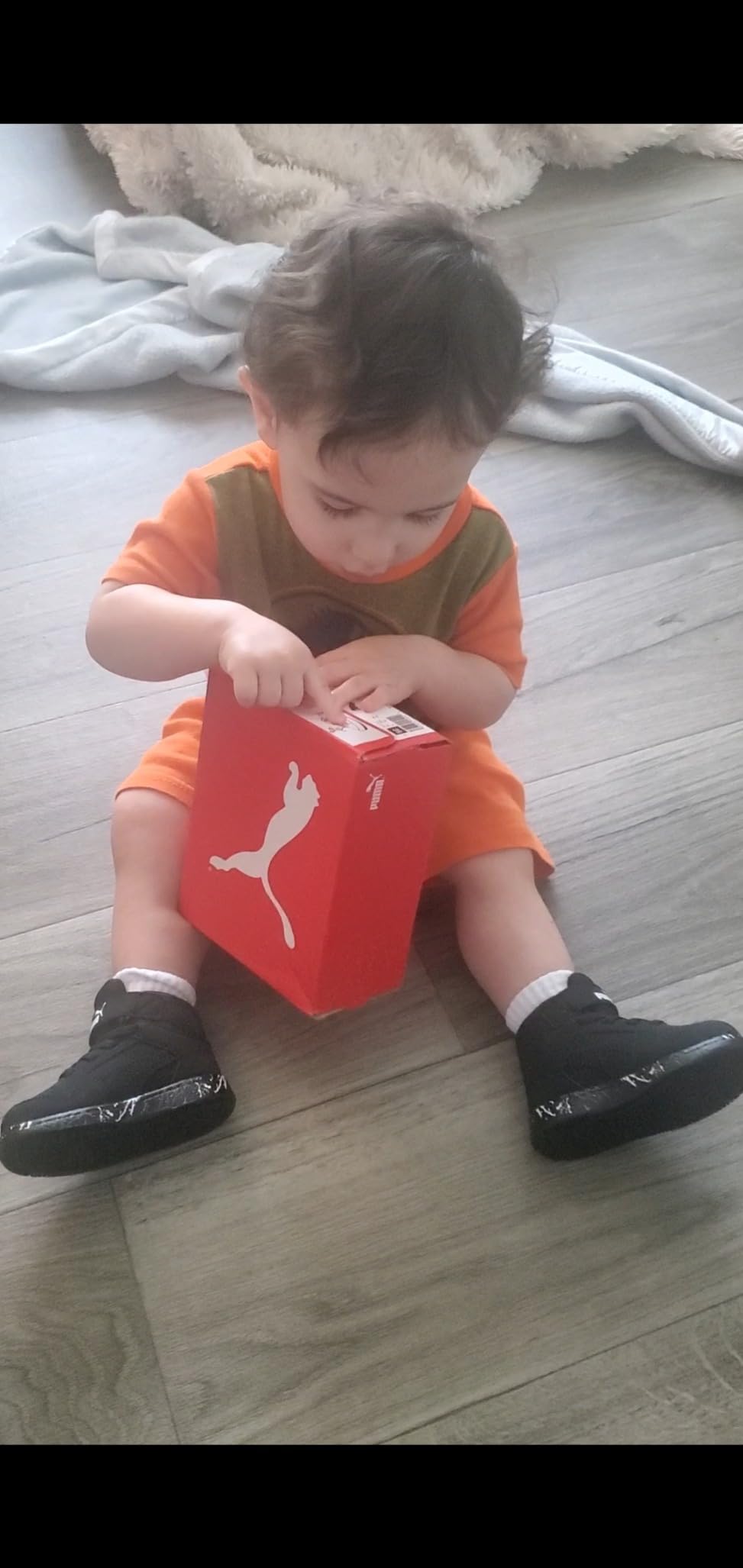 PUMA Kids Rebound Layup Mid showing wear patterns after months of use