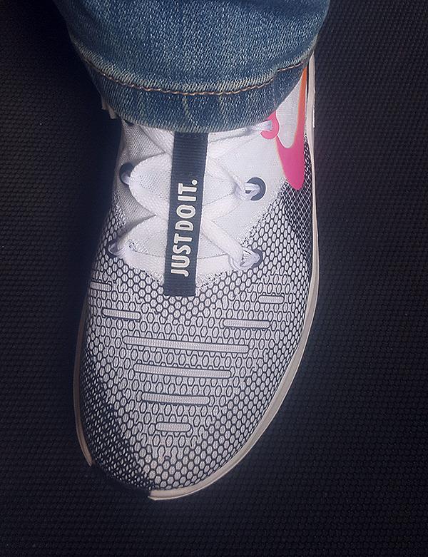 Nike Women's training shoes in action during workout session showing flexibility and movement