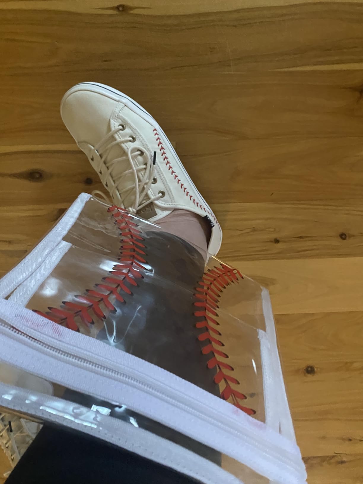 Side profile of Keds baseball sneakers showing heel design and overall shoe silhouette
