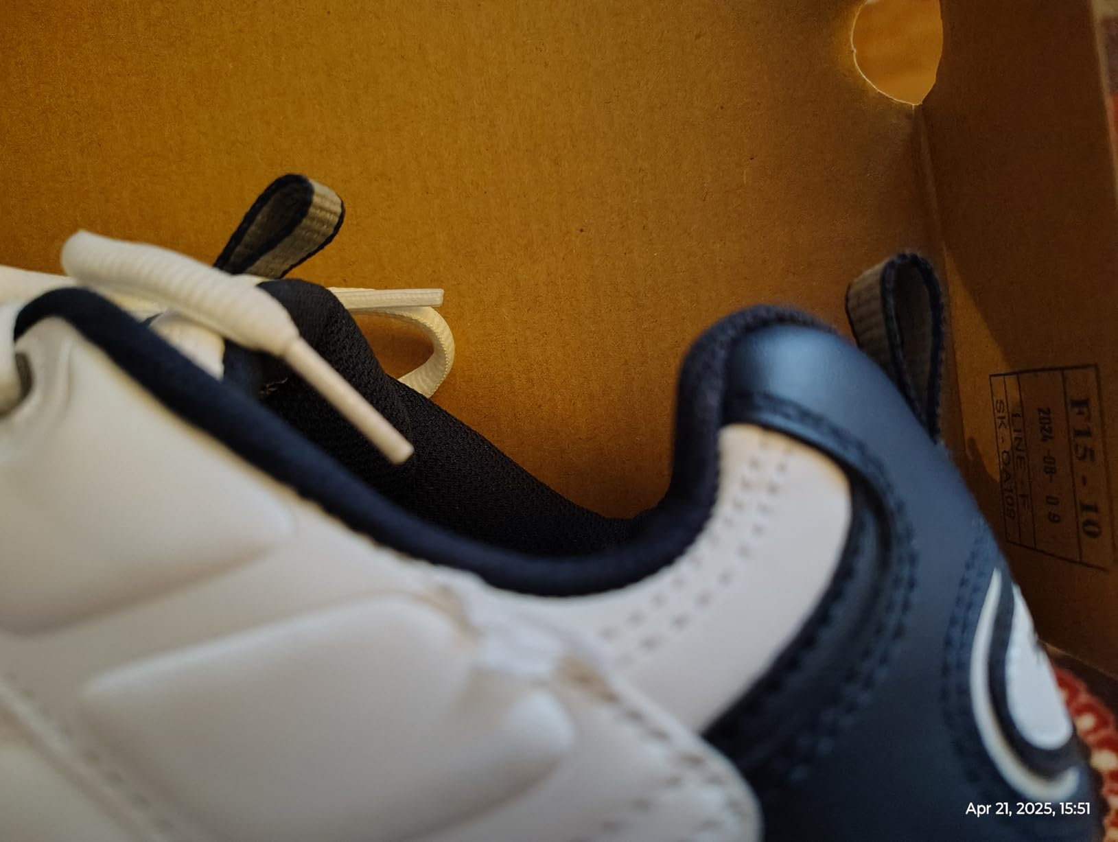 Close-up detail of Skechers Energy Afterburn showing leather upper construction and lace system