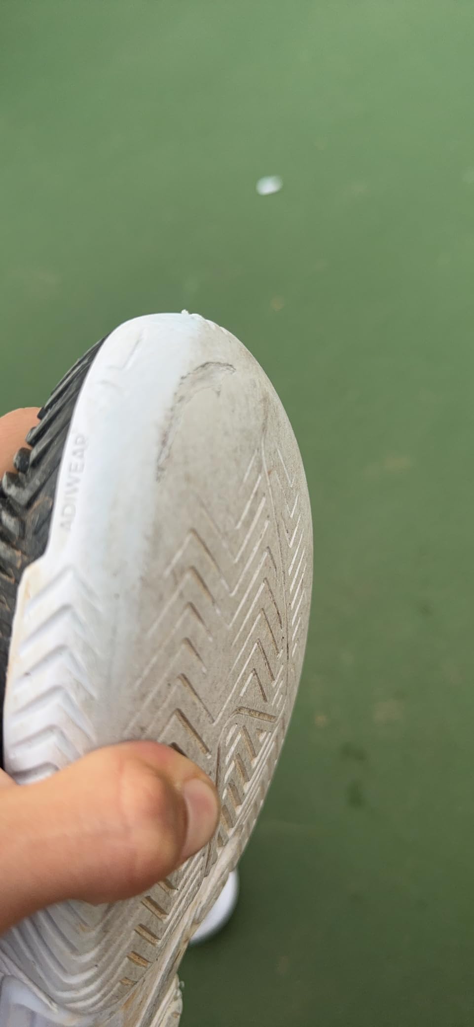 Adidas Barricade showing toe wear after 2 months of intensive tennis play, demonstrating durability concerns