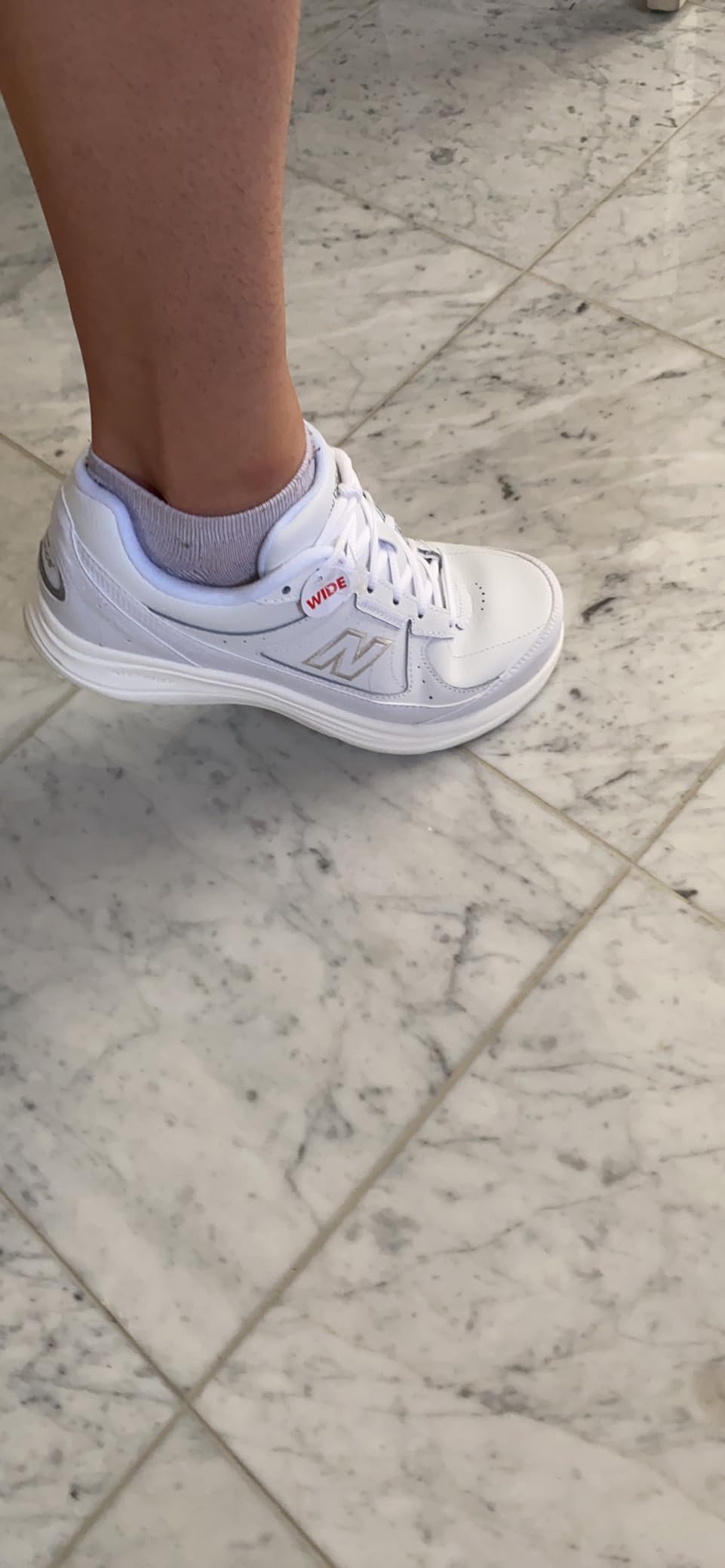 Bottom view of New Balance 577 V1 showing rubber outsole tread pattern and wear characteristics