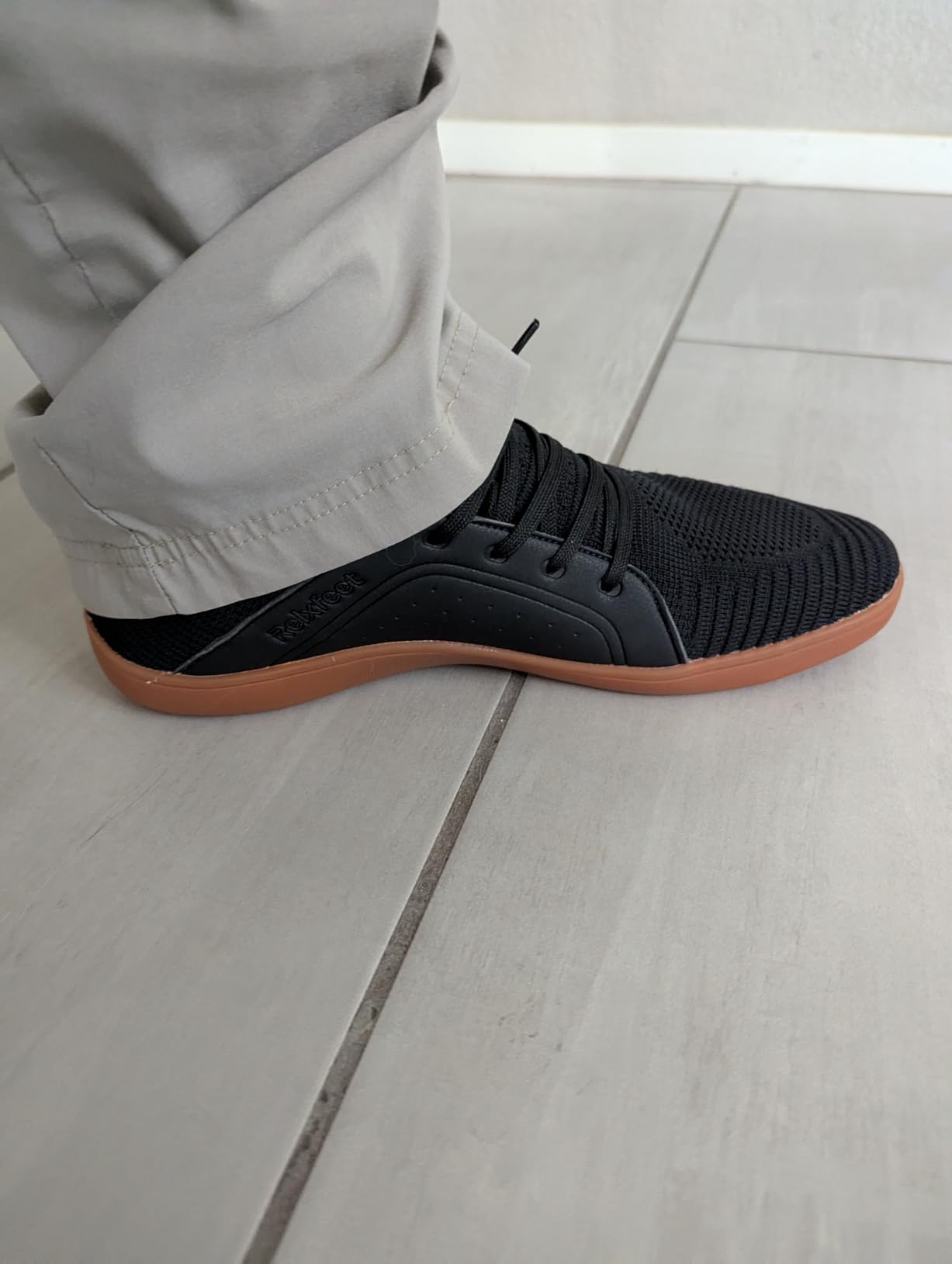 Outdoor testing showing sole flexibility and ground contact on varied surfaces