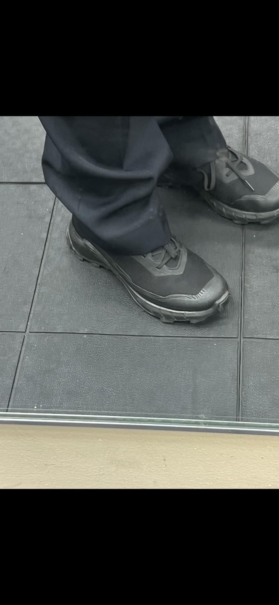 Salomon Alphacross 5 Gore-Tex Contagrip outsole showing 6.5mm aggressive lug pattern for traction
