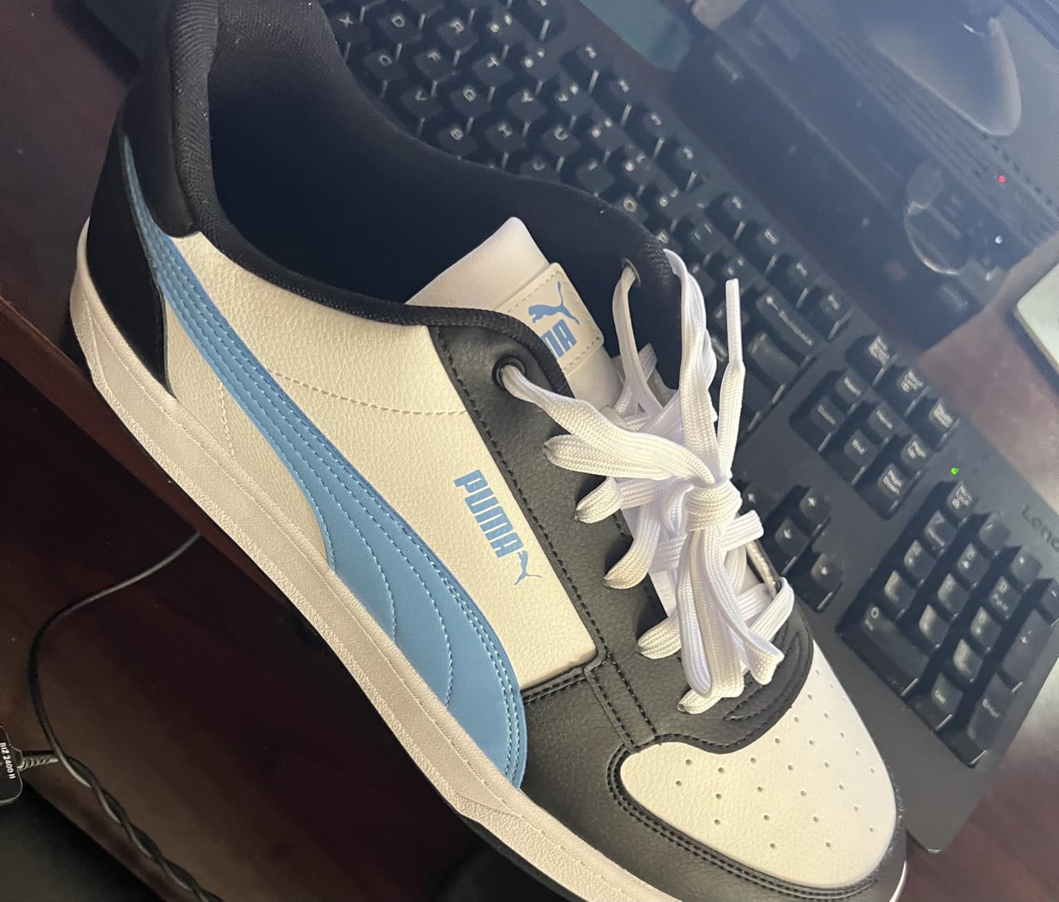 PUMA Caven 2.0 lifestyle shot showing versatile styling and clean aesthetic