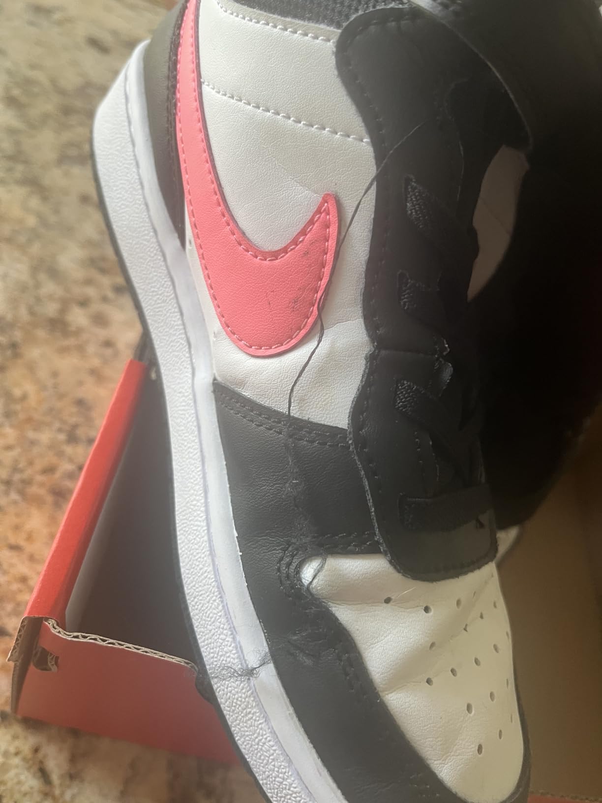 Nike Boy's Sneaker showing lacing system and overall construction quality after testing period