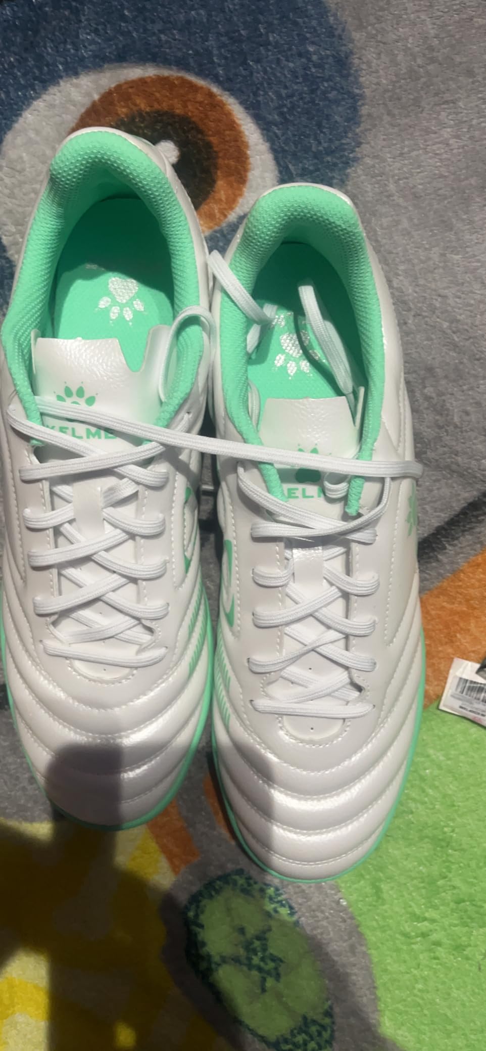 KELME turf shoes showing different colorway options and design variations