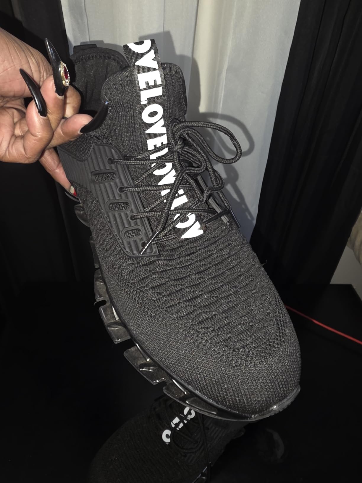 Side profile of Chopben running shoes displaying blade sole technology and overall silhouette