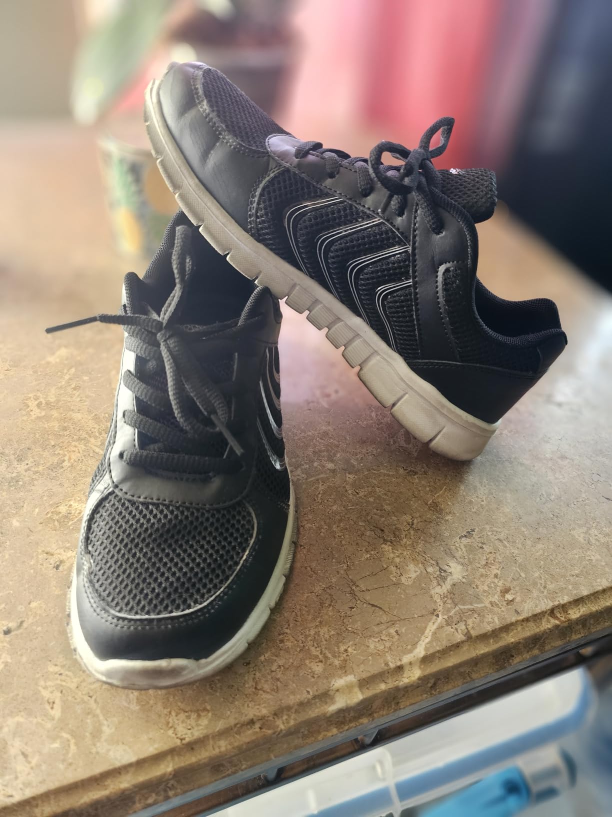 Close-up of Alicegana sneaker mesh upper showing breathable construction and lacing system