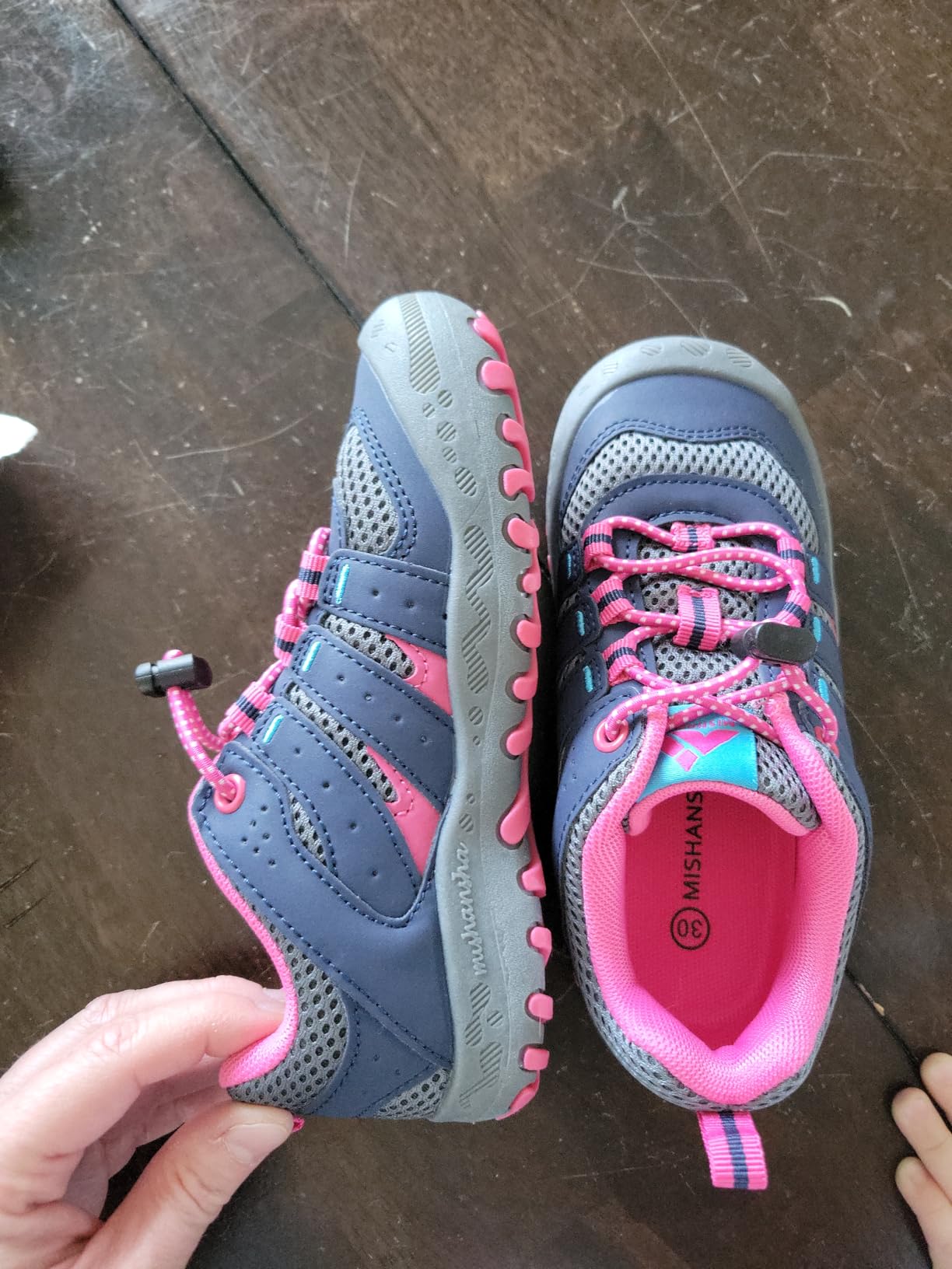 Mishansha kids shoe sole showing deep tread pattern and rubber construction