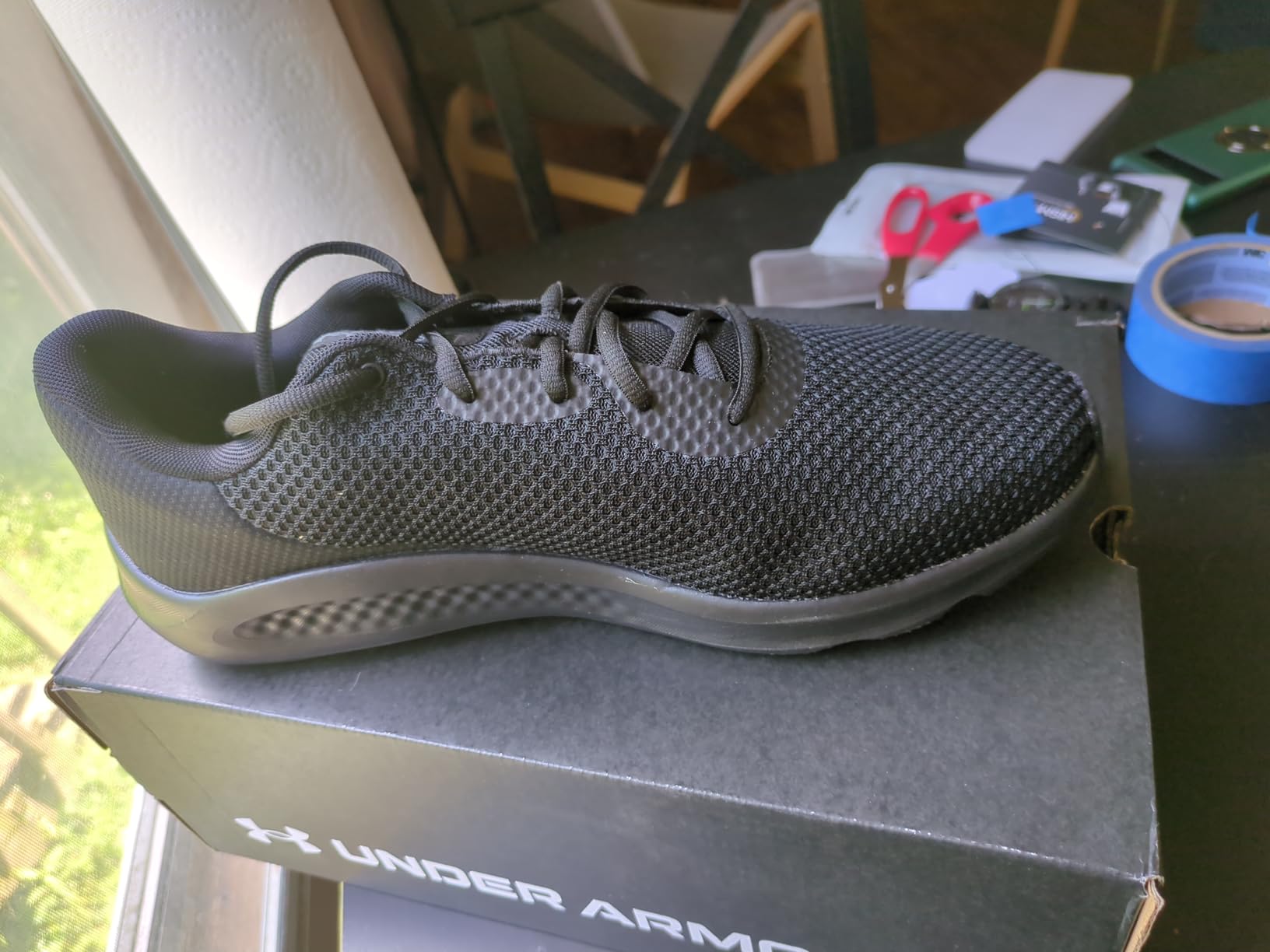 Under Armour Charged Pursuit 3 interior showing foam sockliner and construction details
