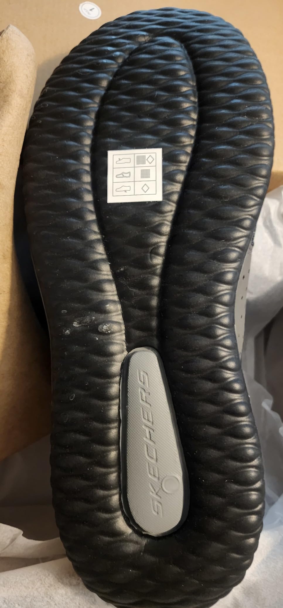 Skechers Delson-Camden in office environment showing business casual styling