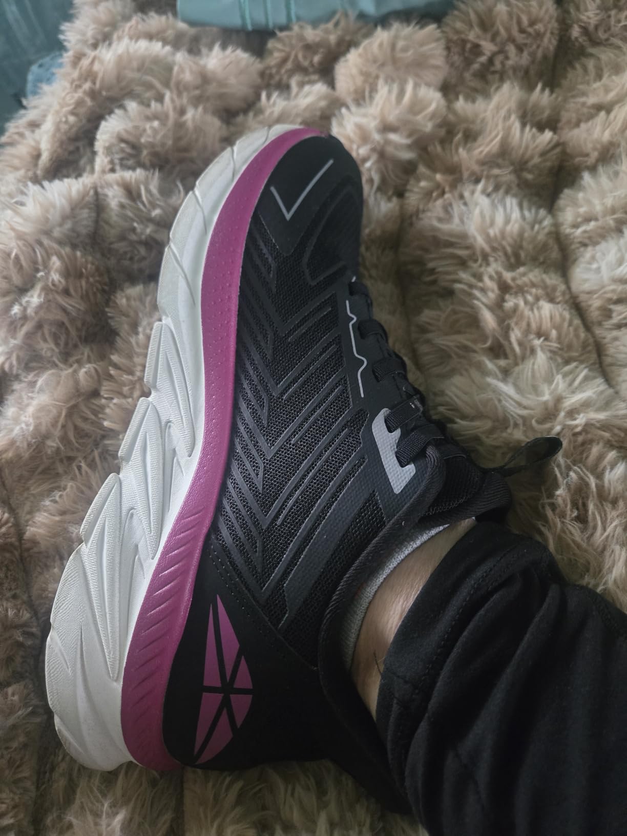 Lifestyle shot of colorful slip-on sneakers showing vibrant design options