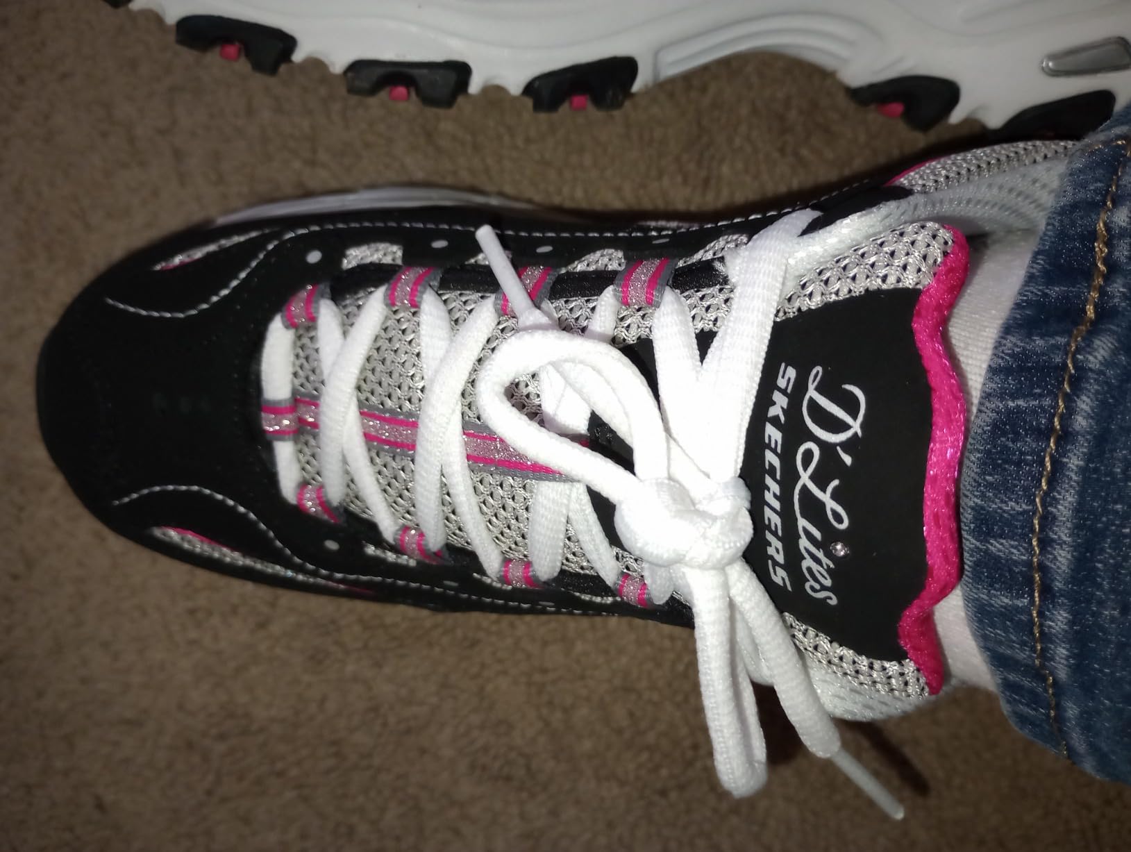 A final hero shot of the Skechers D'Lites in a pretty color pattern, looking ready to wear.
