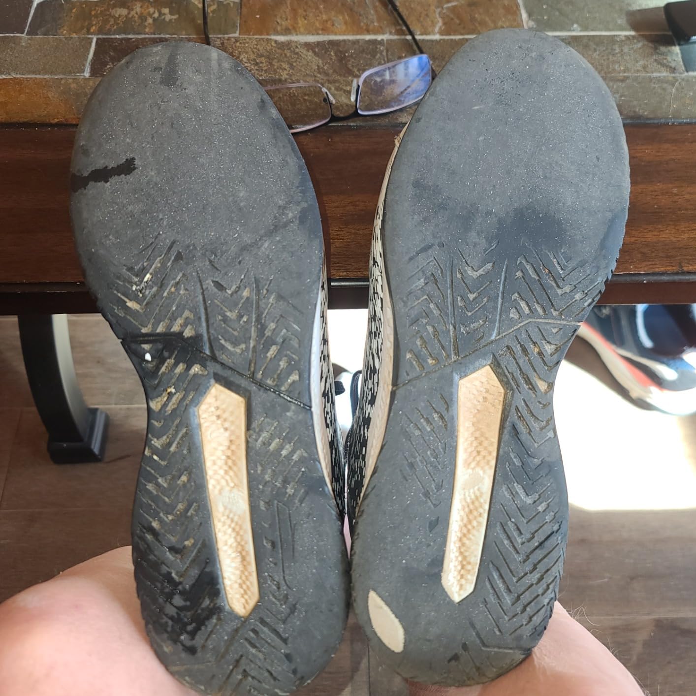 Sole wear pattern after 4 months showing Goodyear rubber deterioration from outdoor court use