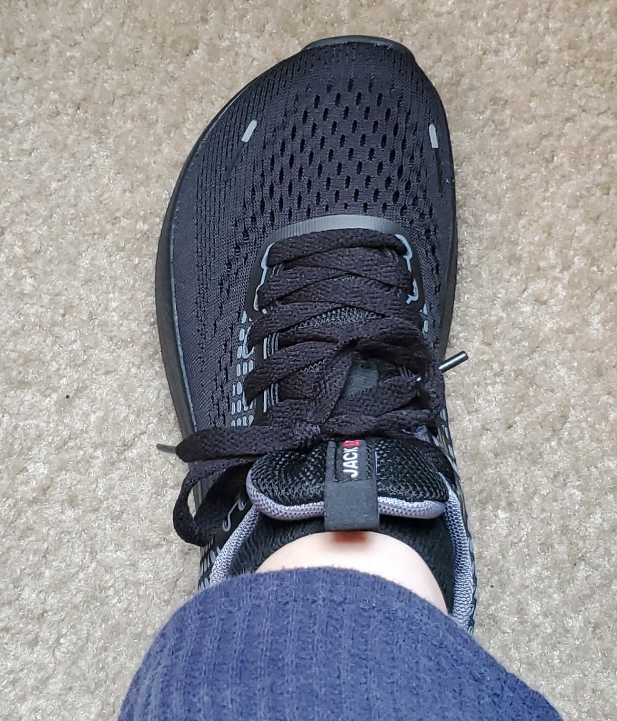 JACKSHIBO shoes worn during daily activities showing practical comfort design