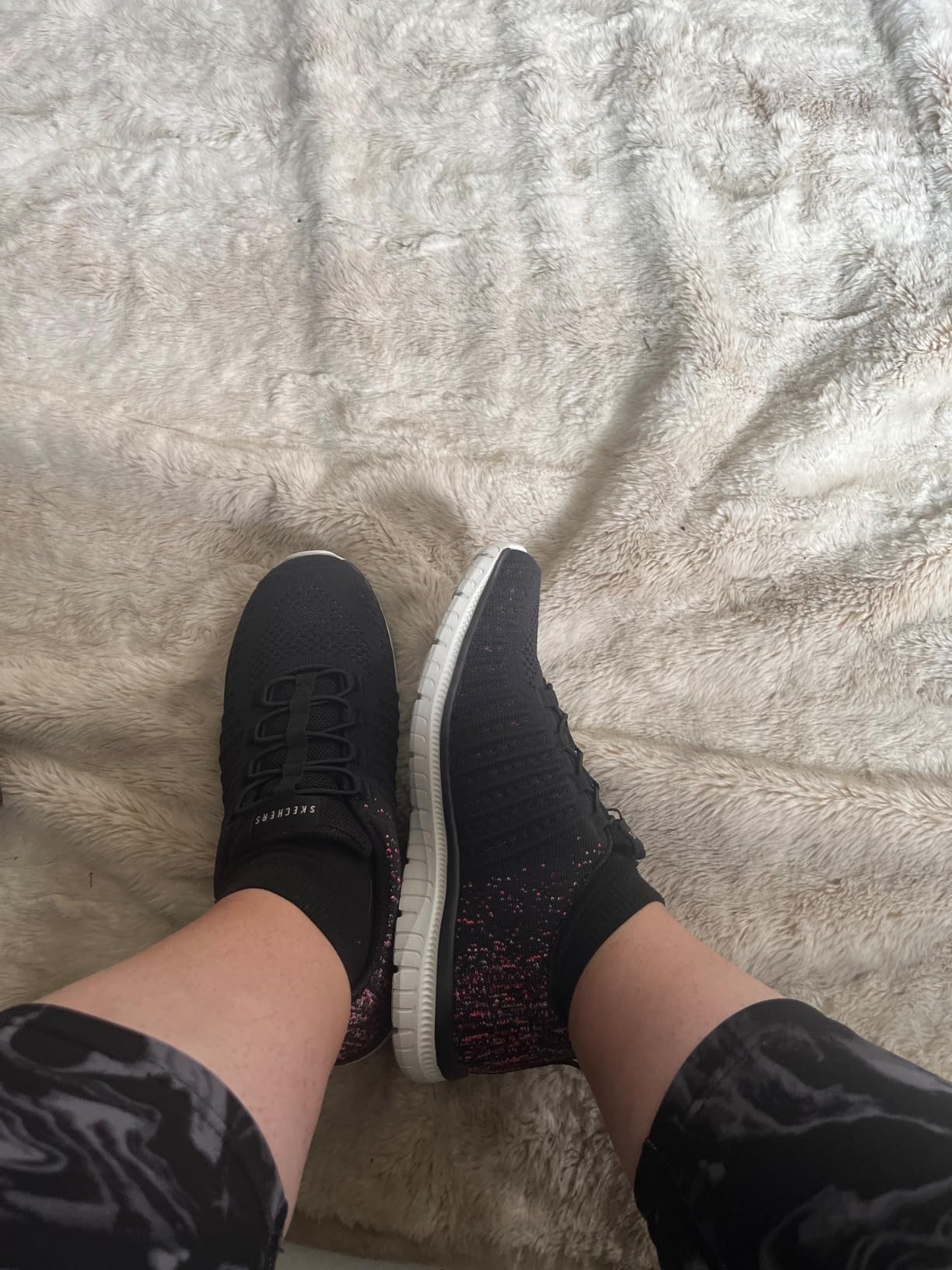 Skechers Virtue sneaker engineered mesh upper showing stretch laces and slip-on construction