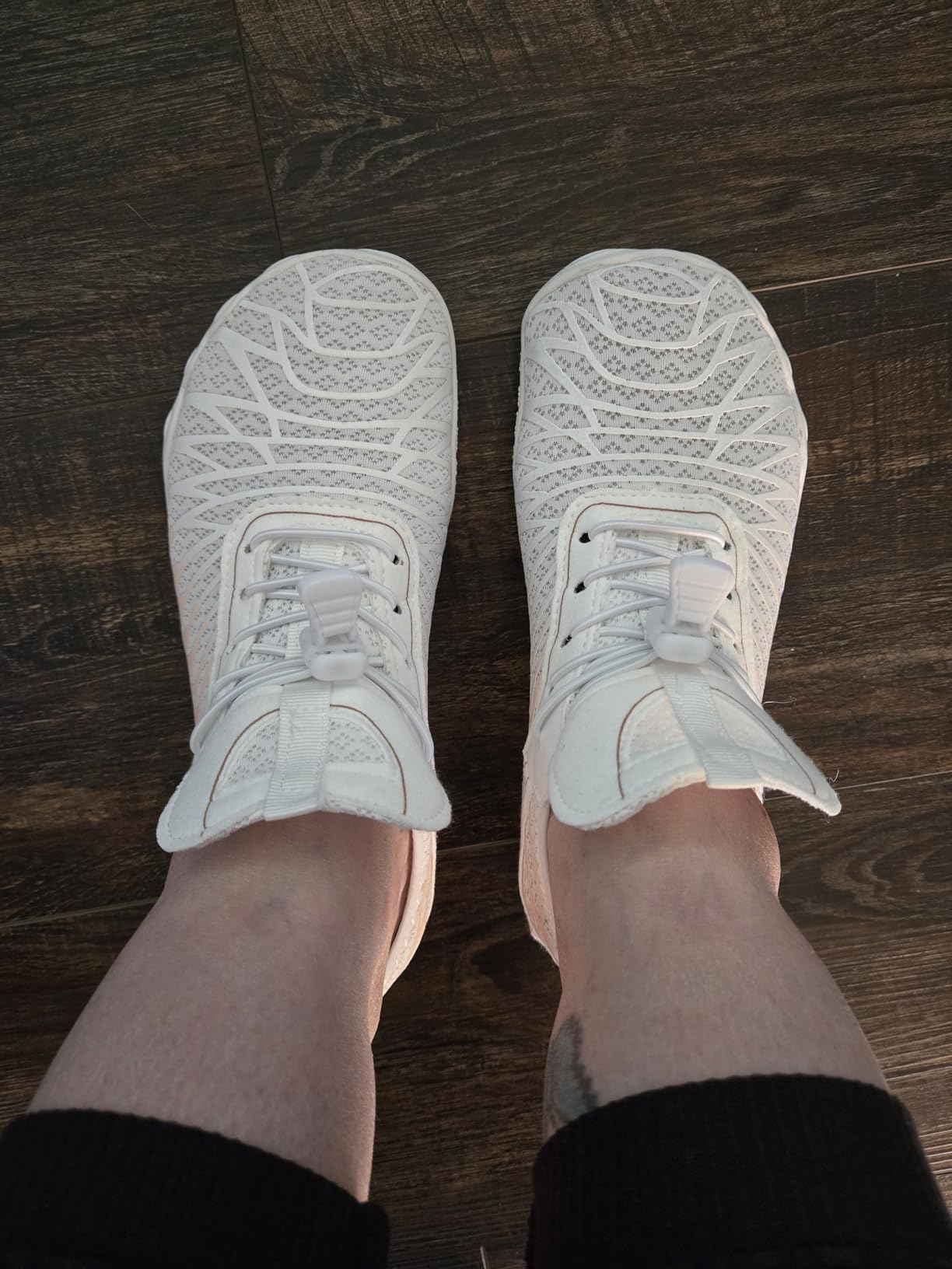 Close-up of sole pattern and construction showing wear patterns after extended use
