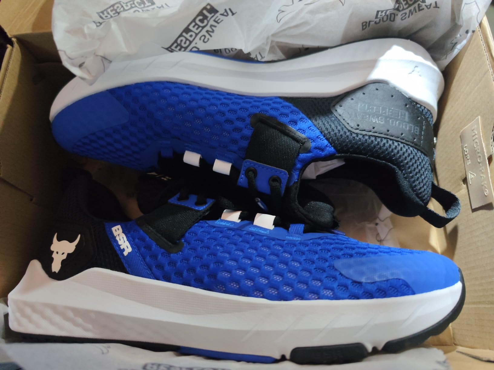 Project Rock BSR 4 training shoes in gym setting showing versatility across different exercises