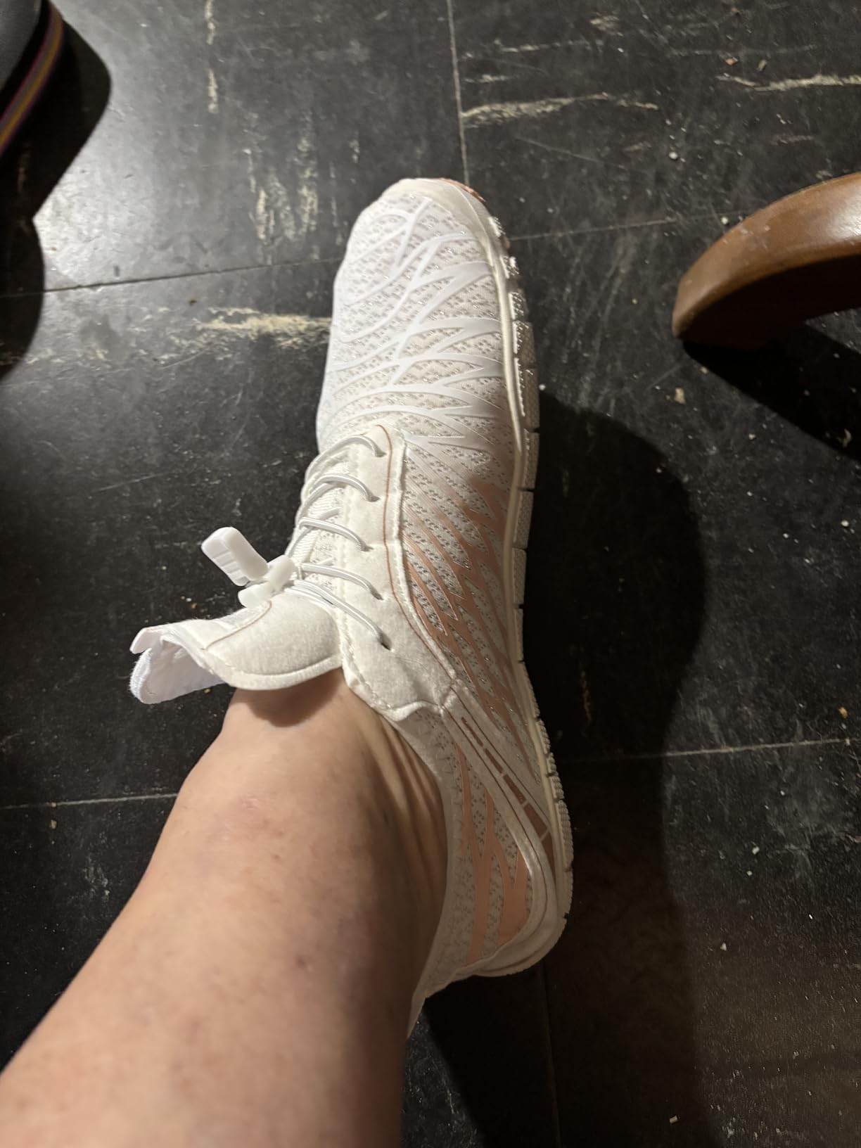 Water-resistant features of barefoot shoes showing drainage holes and quick-dry capabilities