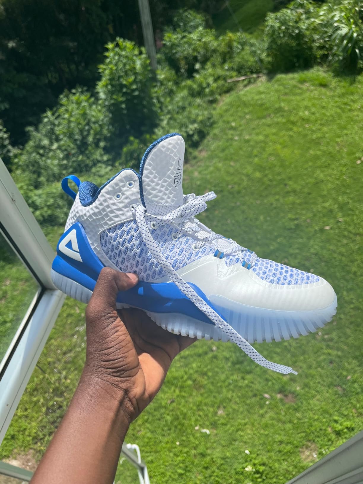 PEAK Streetball Master upper construction showing woven textile and synthetic leather materials
