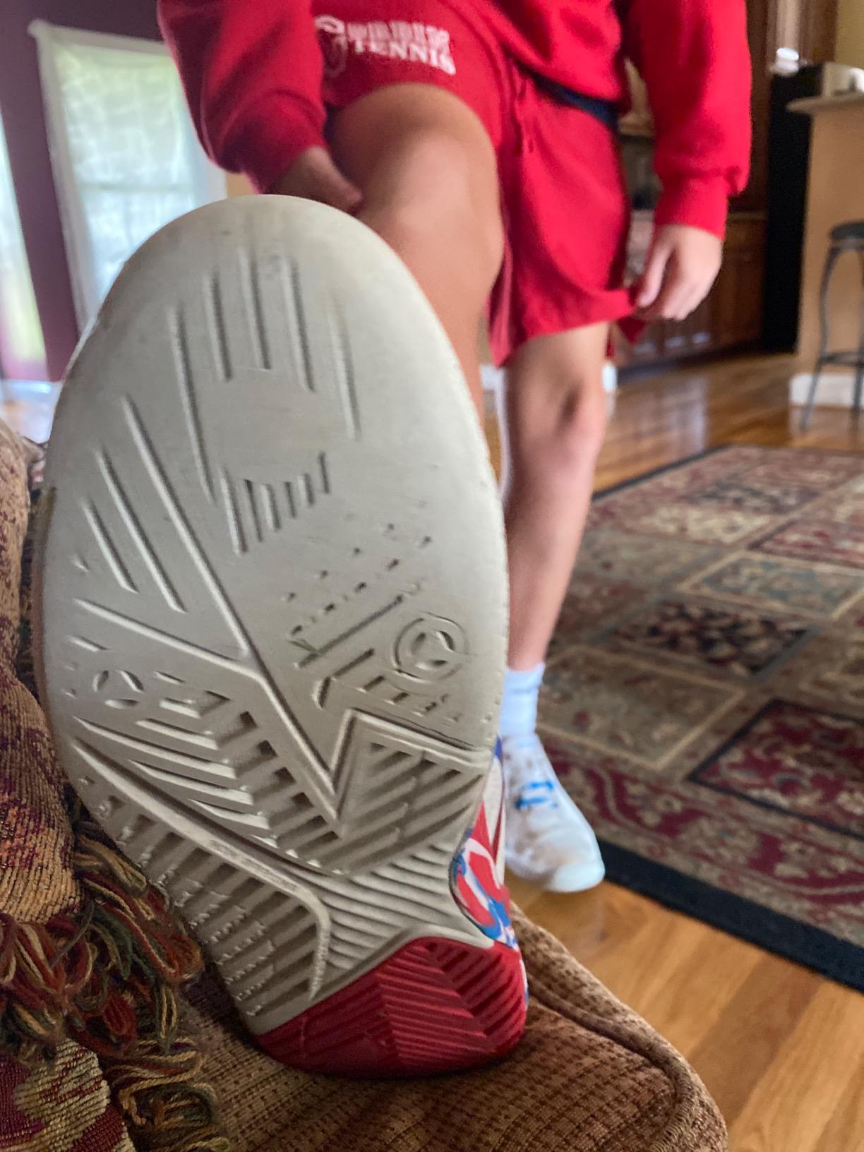 Side-by-side comparison showing ASICS Gel-Resolution 8 tennis shoes after extensive court testing