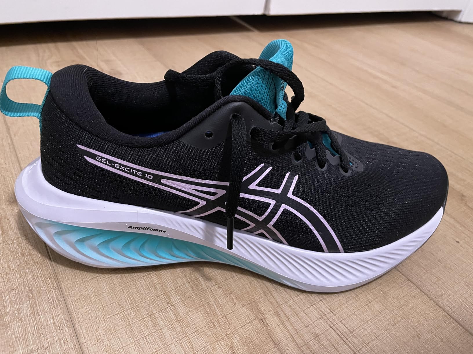 ASICS Gel-Excite 10 side profile showing engineered mesh upper and heel design