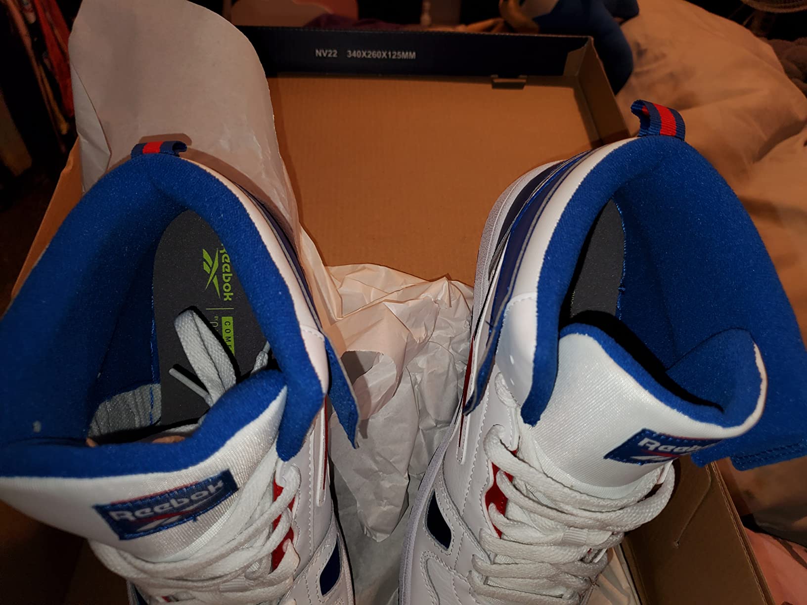 Reebok Resonator Mid basketball shoes showing different angles and styling options