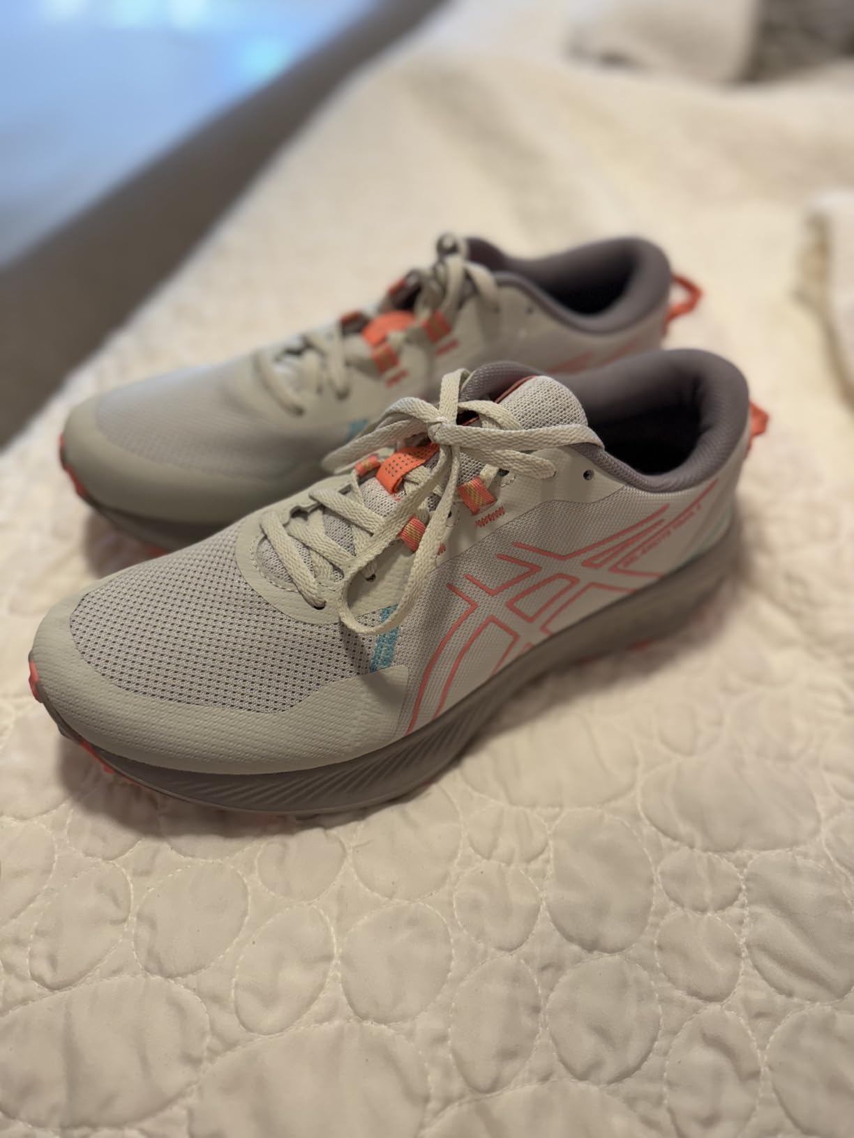 ASICS Women's trail running shoes showing comfortable fit and supportive design for daily activities