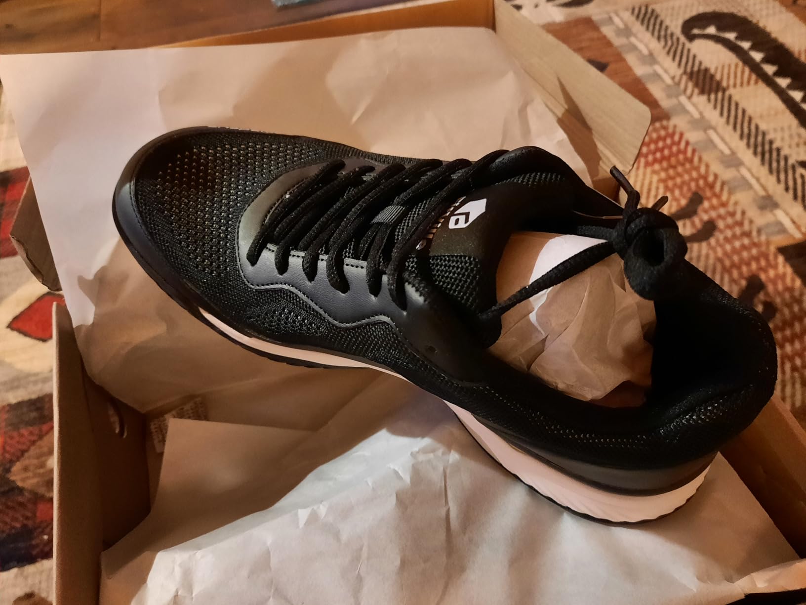 FitVille shoe construction details showing EVA midsole and arch support features