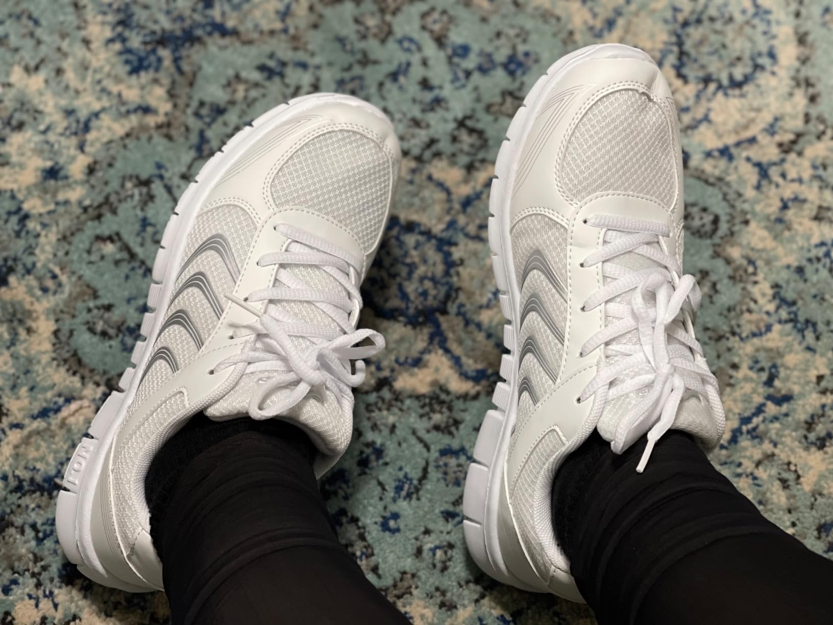 Side view of Alicegana sneakers showing EVA midsole construction and outsole pattern
