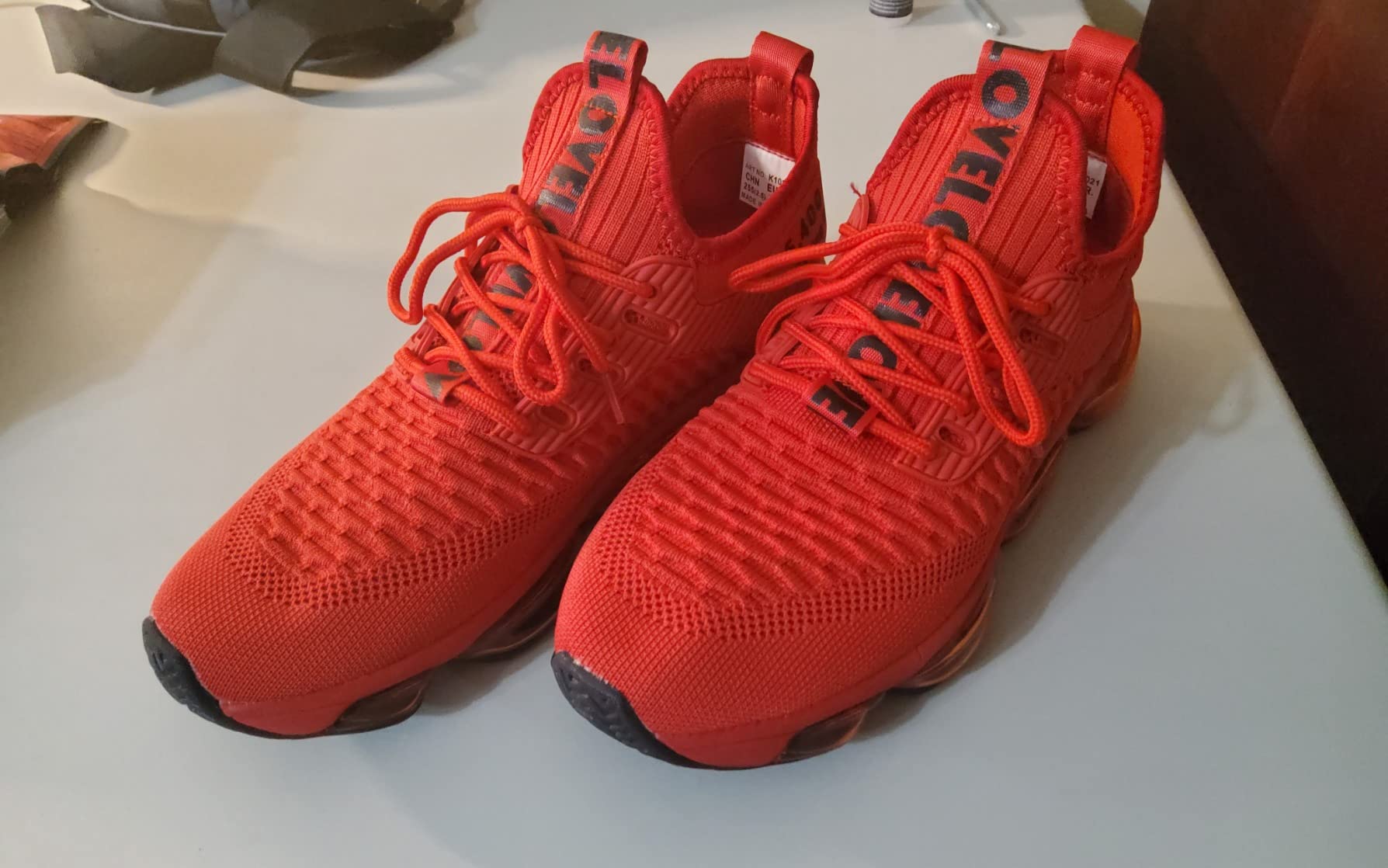 Action shot showing shoe during running motion on pavement