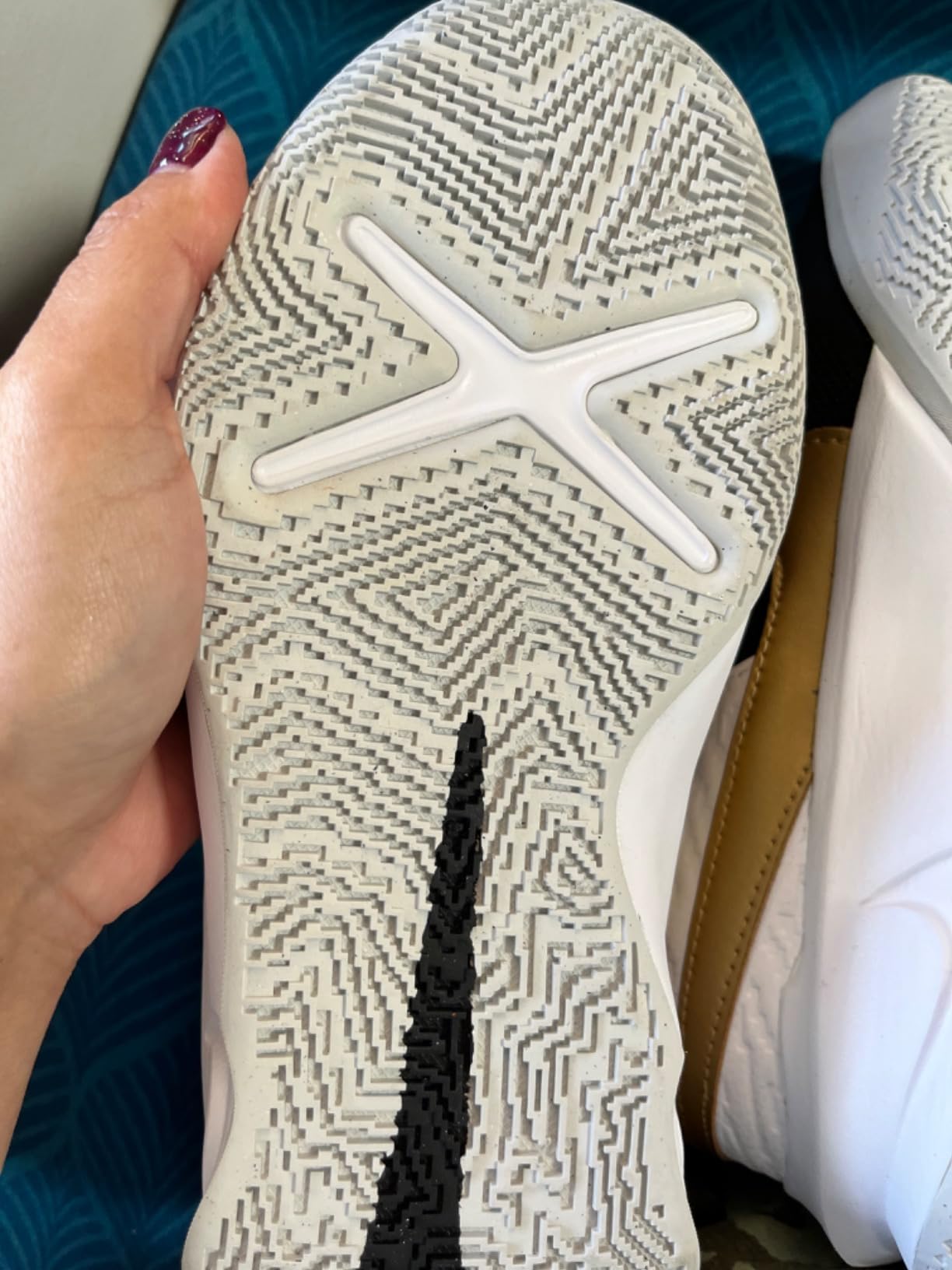 Side by side comparison showing Nike Team Hustle D 10 product variations