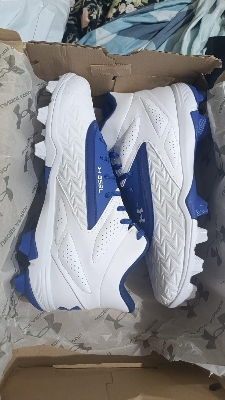 Side profile view of Under Armour Leadoff Mid 3.0 showing ankle support height and overall cleat silhouette