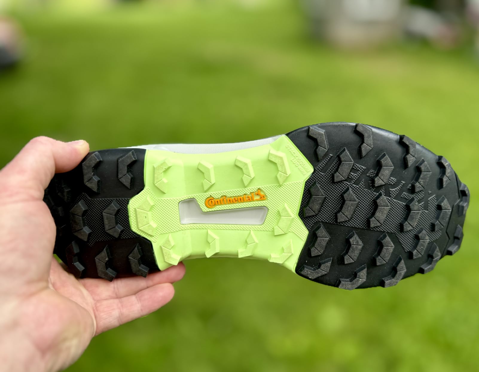Close-up detail of Adidas Terrex AX4 upper construction showing mesh panels and synthetic overlays
