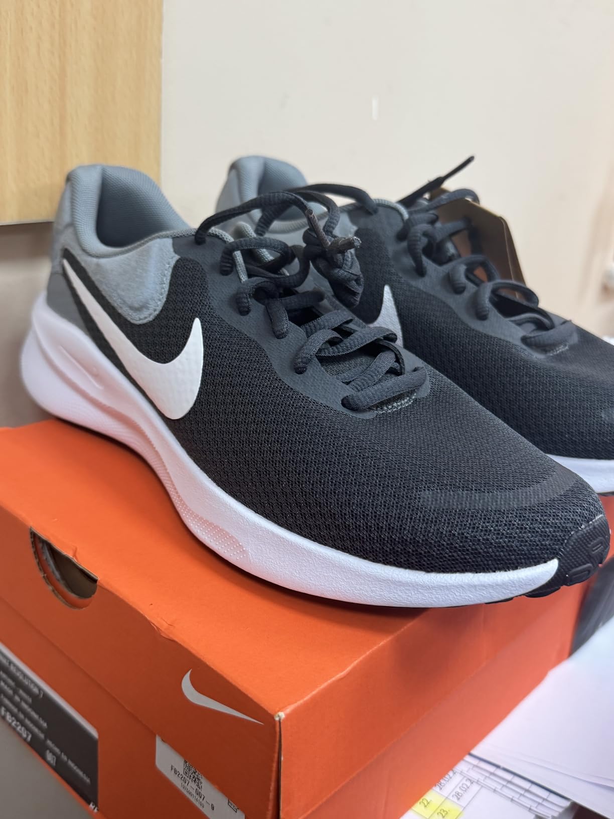 Nike Revolution 7 during gym workout showing versatility for cross-training activities