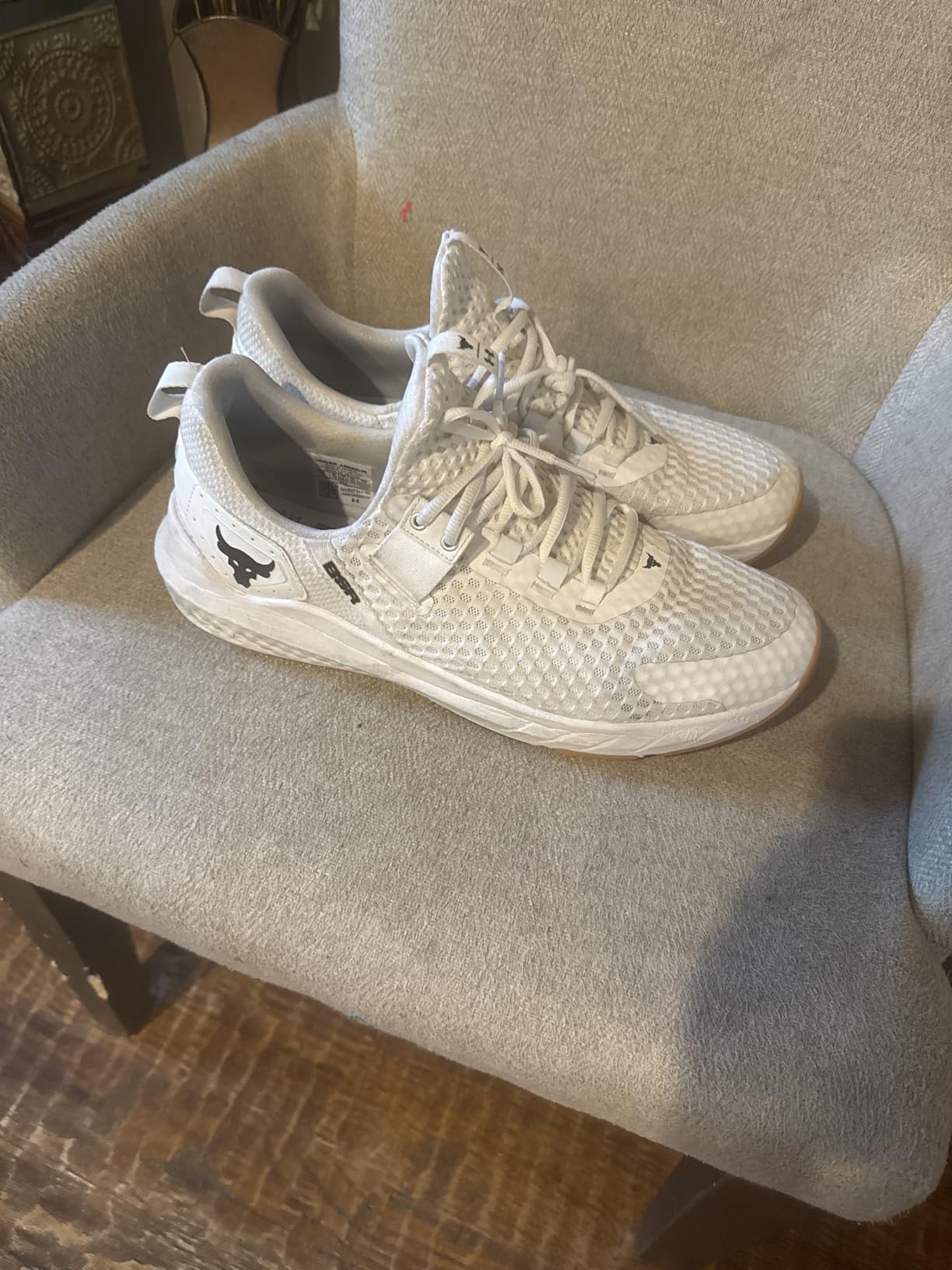 Close-up view of Project Rock BSR 4 showing perforated mesh upper and heel overlays