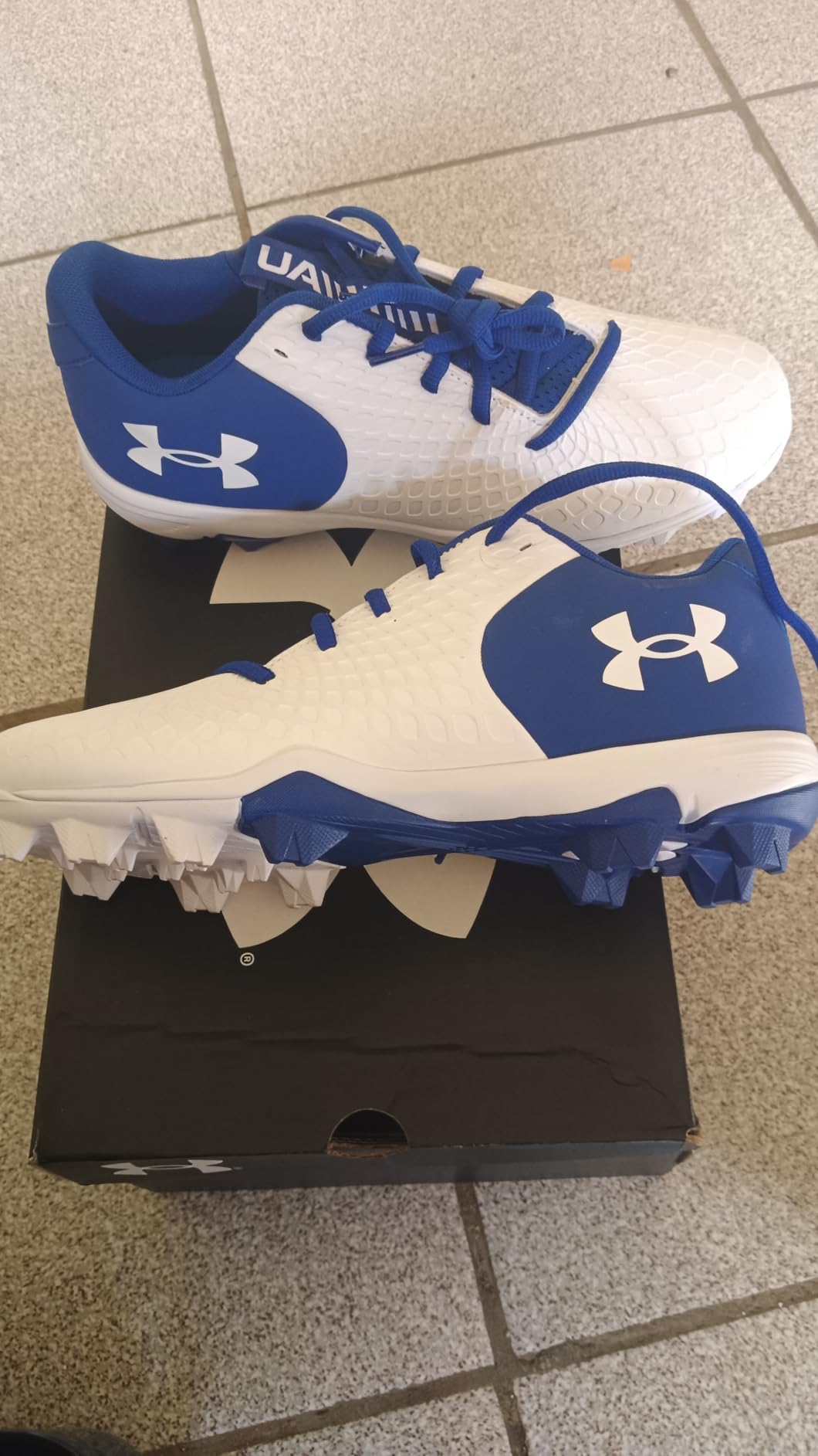 Side profile of Under Armour Glyde 2.0 showing textile upper and heel construction detail