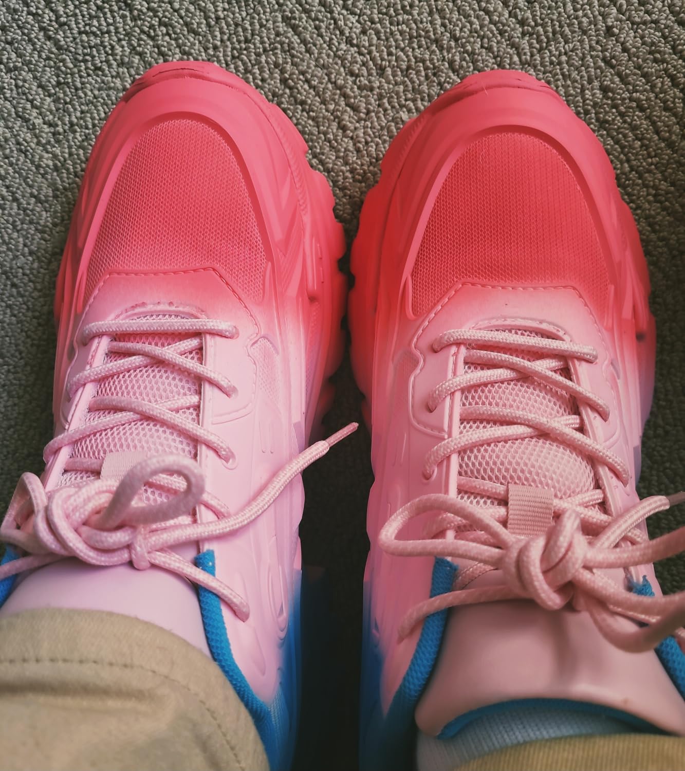 Close-up view of DREAM PAIRS chunky sneakers showing mesh upper and platform sole construction