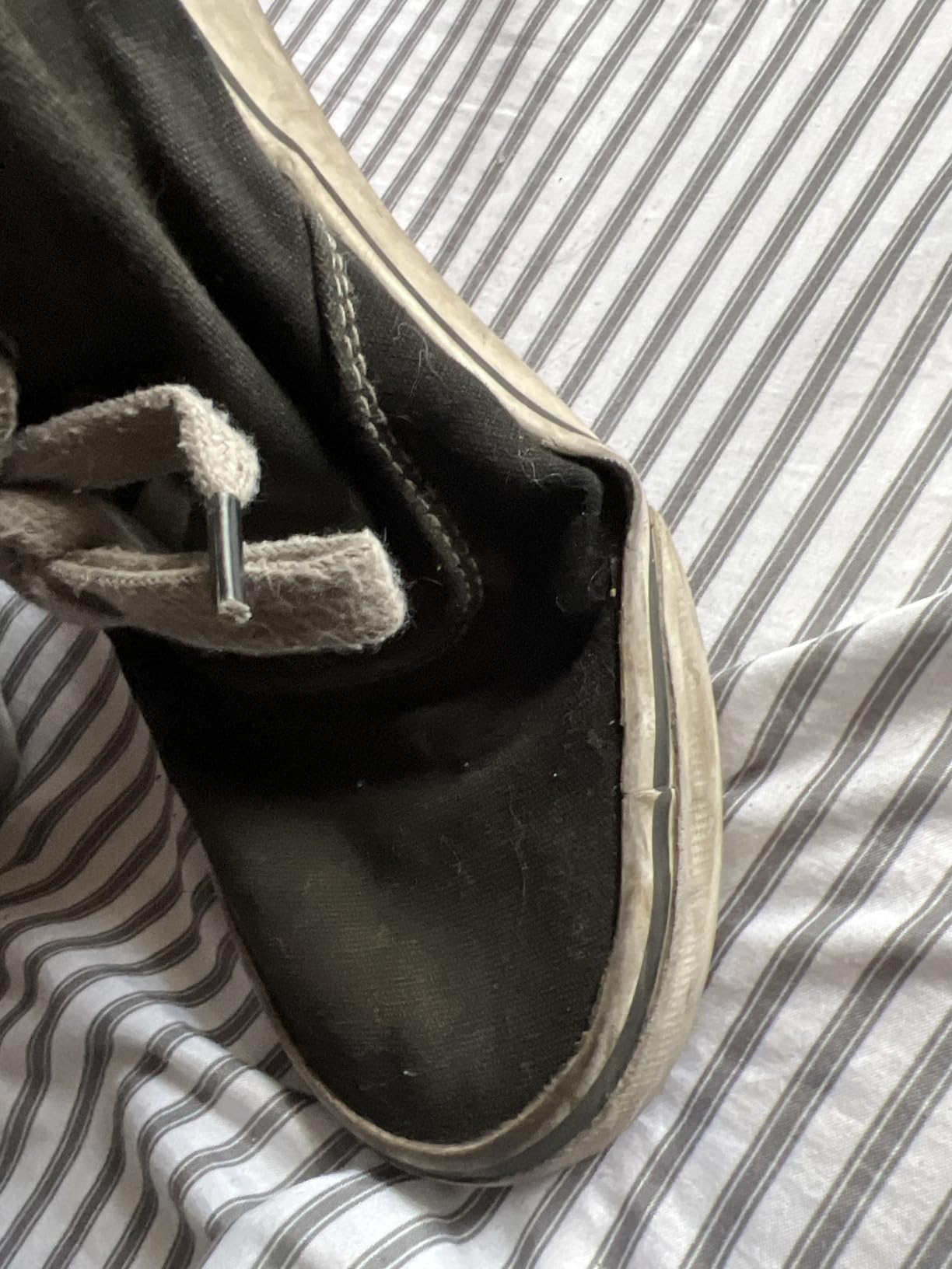 Side profile view of Lugz Lear showing ankle height and heel construction